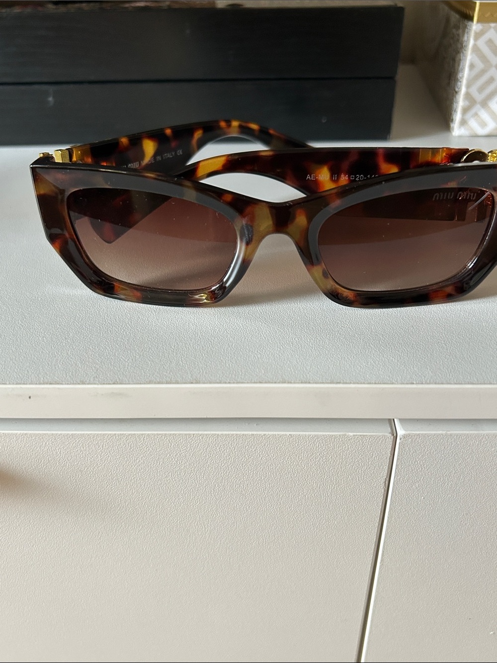 “ Miu Miu” Tortoiseshell Rectangular Sunglasses with Gold Accents - Picture 9 of 9